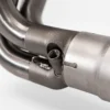 Close-up of welded metal exhaust component.