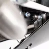 Close-up of motorcycle suspension bolts