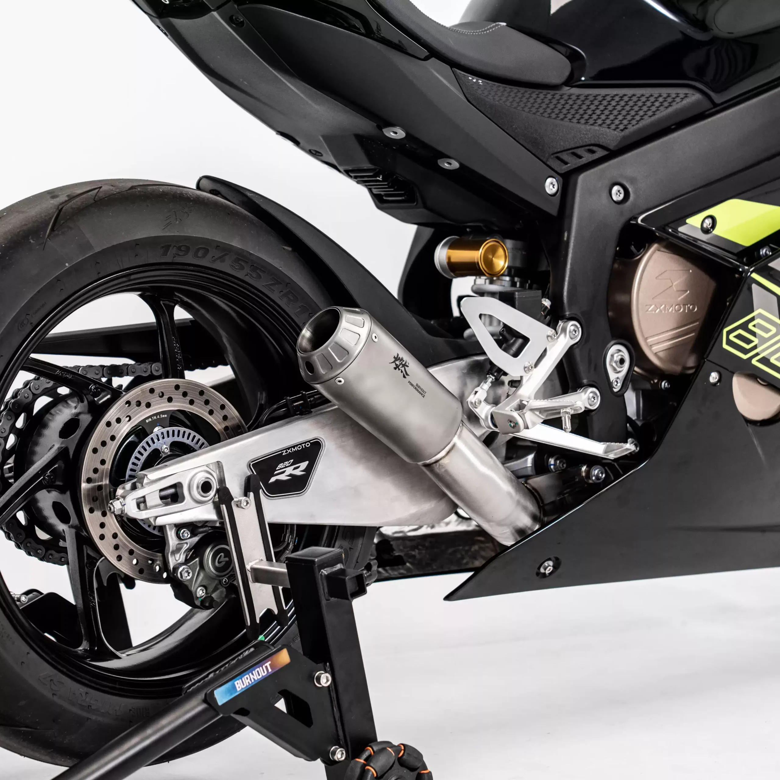 Motorcycle exhaust and rear wheel close-up